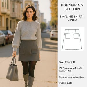 May include: A woman wearing a gray sweater and a gray skirt with two pockets, holding a gray tote bag. The image includes a PDF sewing pattern for a lined Bayline skirt, sizes XS-XXL, with step-by-step instructions and a fabric guide.