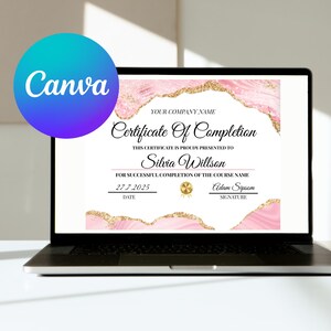 May include: A laptop displays a Certificate of Completion designed with pink and gold accents. The certificate includes the text "Certificate Of Completion", "Silvia Willson", and the date "27.7.2025". A Canva logo is in the upper left corner.