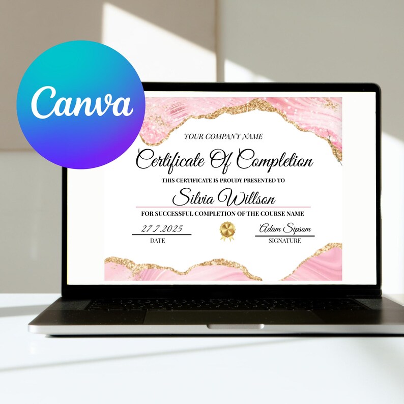 May include: A laptop displays a Certificate of Completion designed with pink and gold accents. The certificate includes the text "Certificate Of Completion", "Silvia Willson", and the date "27.7.2025". A Canva logo is in the upper left corner.