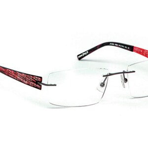 May include: Rimless eyeglasses with rectangular lenses and thin black temples. The temples feature a red and black patterned design. The eyeglasses have a minimalist design and are suitable for everyday wear.