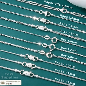 May include: A collection of silver-toned metal chains including paper clip, rope, box, and snake styles. Each chain is labeled with its specific type and width in millimeters, ranging from 1.0mm to 1.8mm, featuring lobster claw or spring ring clasps.