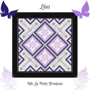 May include: A framed cross-stitch piece with a geometric floral design in purple and white. The artwork is in a black square frame. The words "Lilas" and "Kiki La Petite Brodeuse" are displayed. The design is reminiscent of a quilt.