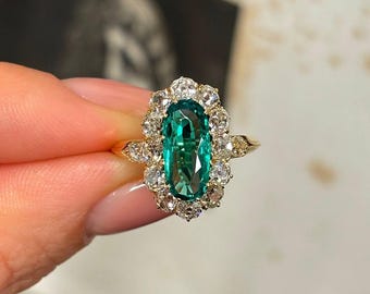 Pierścionek z turmalinem Paraiba i diamentami w kształcie halo: neonowo-niebiesko-zielony srebrny