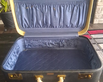 Mala de viagem vintage Towncraft de 21 polegadas, preta com detalhes em azul.