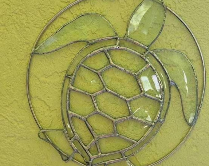 This is a bevel glass item, that will sparkle your window in the sun!