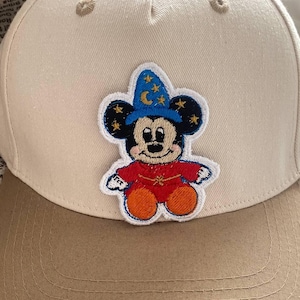 May include: A set of three ceramic mugs with a speckled, matte finish. The mugs are in shades of cream, light gray, and dark gray. Each mug has a simple, minimalist design, perfect for coffee or tea.