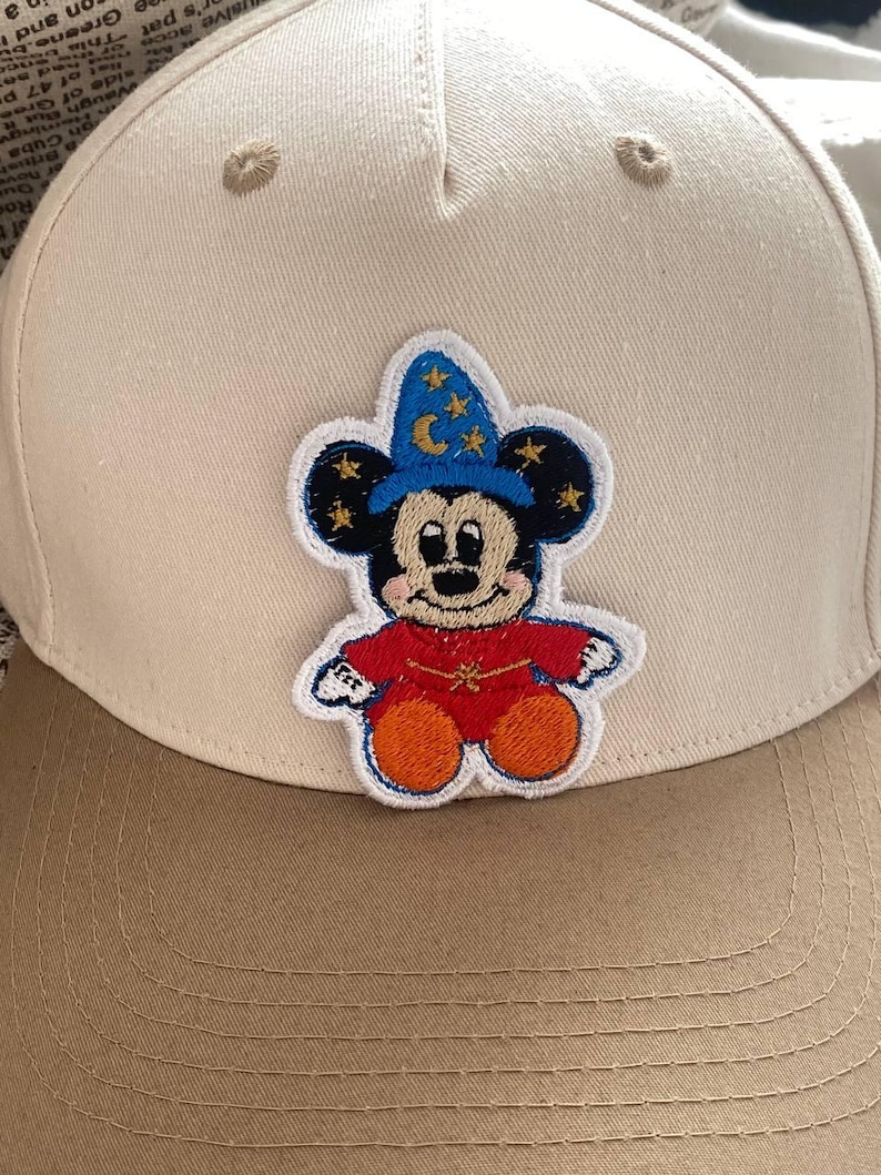 May include: A set of three ceramic mugs with a speckled, matte finish. The mugs are in shades of cream, light gray, and dark gray. Each mug has a simple, minimalist design, perfect for coffee or tea.