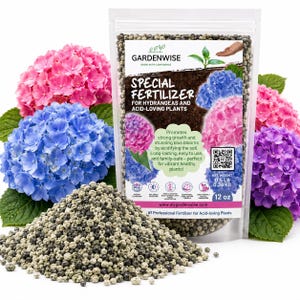 May include: A clear plastic pouch of Gardenwise Special Fertilizer for hydrangeas and acid-loving plants, containing small grey and white granules. The label features text, a QR code, and images of pink, blue, and purple hydrangea flowers.