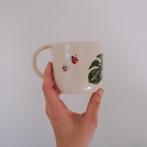 Bamboo Brush Painted Ceramic Mug // Monstera with Ladybugs