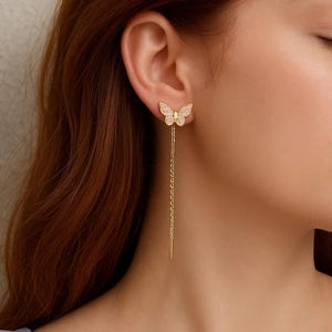 Butterfly stud earrings with a dangling chain for women