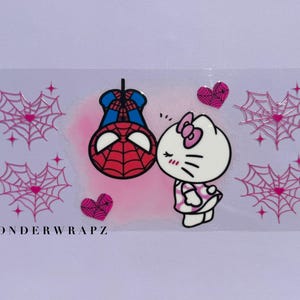 May include: A sticker featuring Spider-Man and Hello Kitty kissing, surrounded by pink hearts and spiderwebs. The text "WONDERWRAPZ" is at the bottom. The characters are set against a light pink background.