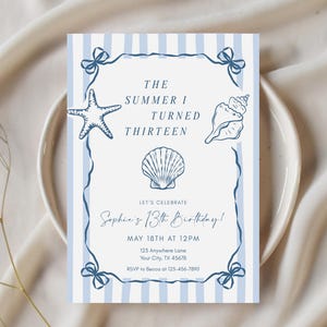 May include: A rectangular invitation card with a light blue and white vertical striped border. The center features dark blue illustrations of a starfish, a conch shell, and a scallop shell. Text reads: THE SUMMER I TURNED THIRTEEN, LET'S CELEBRATE Sophie's 13th Birthday! MAY 18TH AT 12PM, 125 Anywhere Lane, Your City, TX 45678, RSVP to Becca at 123-456-7890.