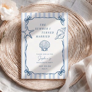 May include: A rectangular invitation card featuring light blue vertical stripes and a dark blue border with bow accents. The text reads THE SUMMER I TURNED MARRIED, PLEASE JOIN US FOR Sophie's BACHLORETTE PARTY, JULY 22-24, Miami, FL, with starfish and seashell illustrations.