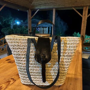 Handmade Woven Straw Bag with Black Leather Straps – Boho Beach Tote – Natural Market Basket – Ethical Summer Handbag – Gift for Her