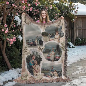 May include: A woven tapestry blanket featuring a collage of vintage photographs, butterflies, and floral accents. The blanket has a fringed edge and a neutral color palette with beige, brown, and green tones. The images depict people near a vintage car.