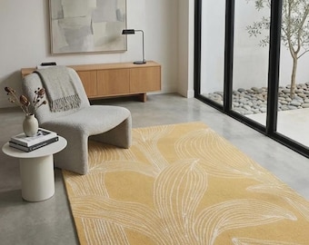 Tapis tufté à la main à motif floral jaune moutarde, moderne et doux, pour salon ou chambre.