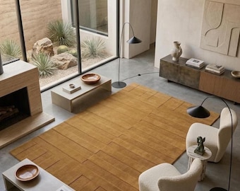 Tapis en laine tuftée à la main, marron neutre, style moderne et minimaliste, idéal pour un salon.