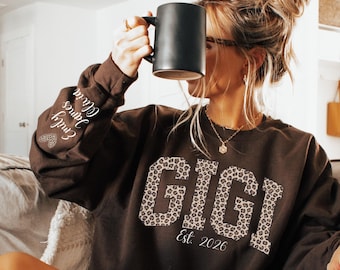 Custom Leopard Gigi Sweatshirt With Kid Name On Sleeve, Personalized Gigi Sweatshirt,Gift For Gigi,Gigi Est Year Sweatshirt,Mothers Day Gift