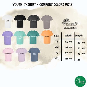 May include: A display of youth t-shirts in various colors, including white, black, and blue jean. The image includes a size chart with measurements in inches and the text "YOUTH T-SHIRT - COMFORT COLORS 9018".