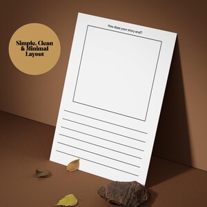 May include: A white paper with a black border and lines for writing, with the text "How does your story end?" and "Simple, Clean & Minimal Layout". The paper is propped up against a brown background with leaves and a rock.