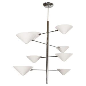 May include: A modern chandelier with a chrome finish and white, triangular-shaped shades. The fixture has a central vertical pole with horizontal arms extending outwards, each holding a shade. The shades are evenly spaced and point downwards.