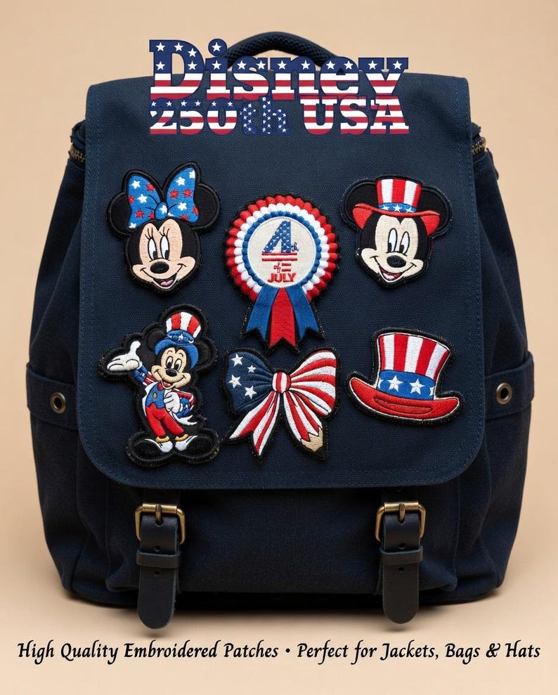 May include: A navy blue backpack adorned with embroidered patches featuring Disney characters and patriotic symbols. Patches include Minnie and Mickey Mouse, a bow, a top hat, and a 4th of July ribbon. The text "Disney 250th USA" is at the top.