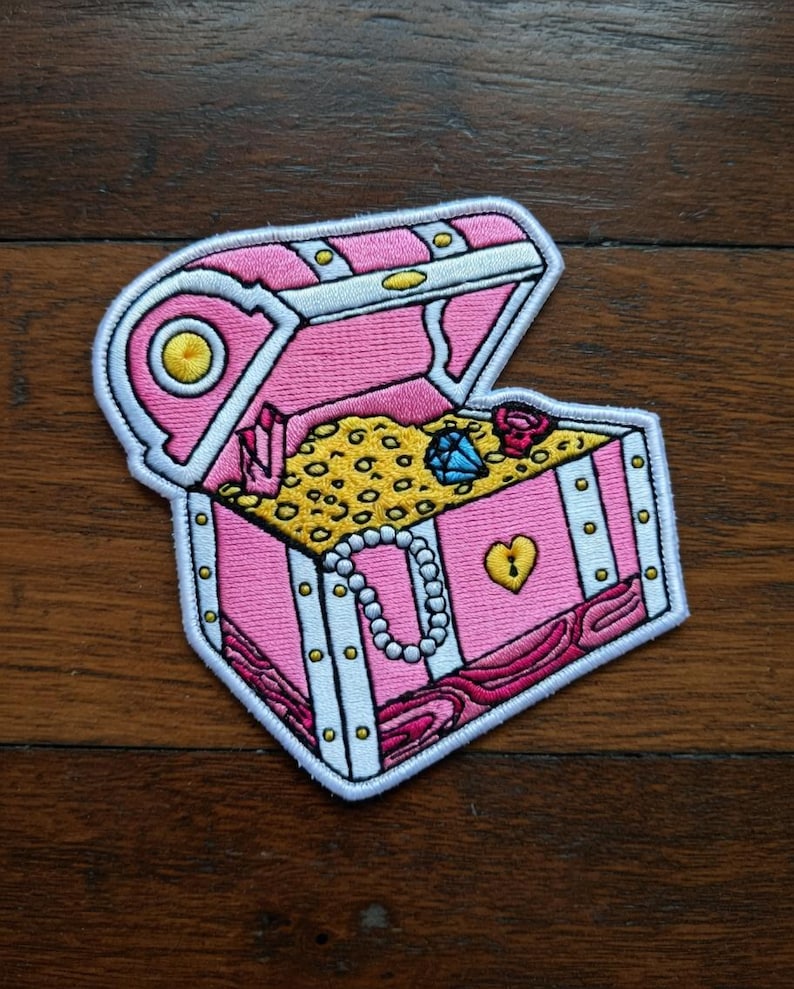 May include: A set of three ceramic mugs with a speckled, matte finish. The mugs are in shades of cream, light gray, and dark gray. Each mug has a simple, minimalist design, perfect for coffee or tea.