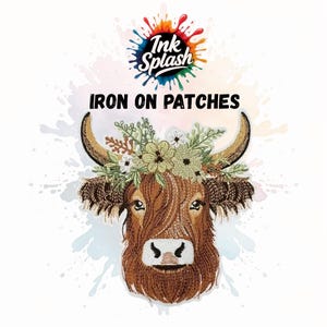 May include: Embroidered iron-on patch depicting a Highland cow wearing a floral crown. The patch is in shades of brown and tan, with the words "IRON ON PATCHES" above the cow. The Ink Splash logo is at the top.