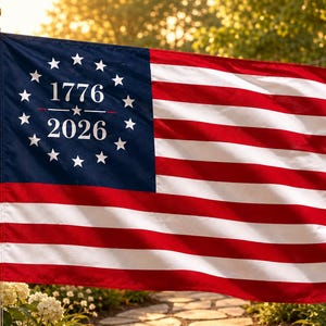 May include: A rectangular flag featuring thirteen horizontal red and white stripes and a blue canton. The blue field contains a circular arrangement of thirteen white stars surrounding the white text 1776 above the text 2026 with a star between.