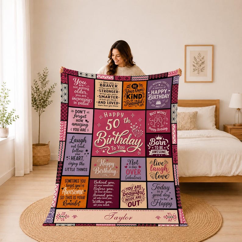 May include: A rectangular throw blanket featuring a patchwork design with various shades of pink, purple, and orange. The text includes Happy 50th Birthday to You, Taylor, and several inspirational quotes about aging, beauty, and happiness.