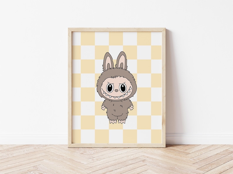 May include: Framed print featuring a cartoon character in a furry bunny costume with a menacing grin. The character is brown with large eyes and a toothy smile. The background is a yellow and white checkered pattern.