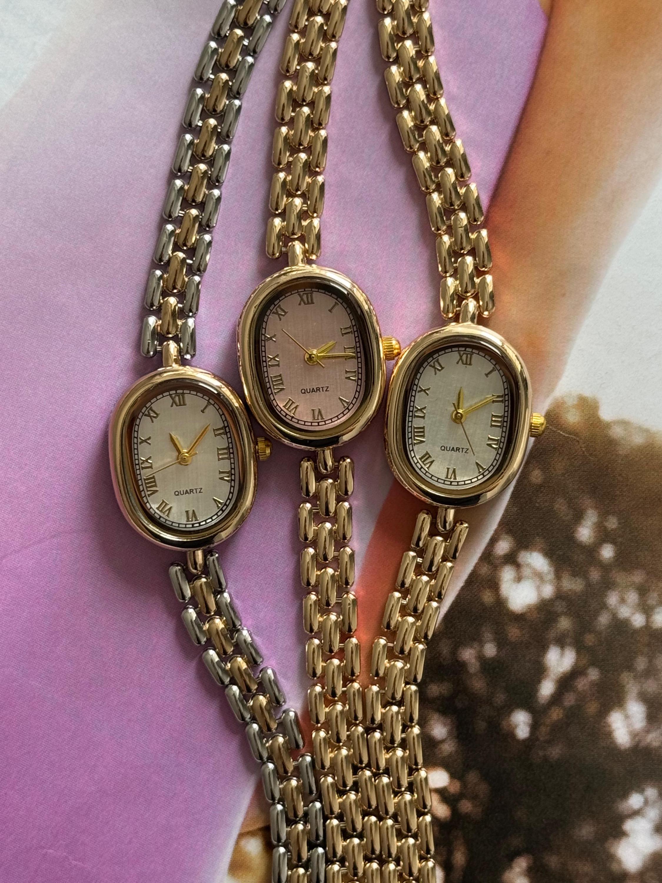 Elegant Women\'s Small Face Oval Quartz Watch | Slim Metal Link Band, Gold/Silver Slim Oval Link Watch Timepiece in Mixed Metal | Caitlyn  main image 2