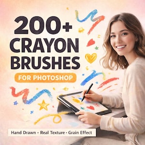 May include: Image promoting 200+ Crayon Brushes for Photoshop. The text is in large, bold font with colorful crayon-style illustrations. A person is shown using a stylus on a tablet, with the words "Hand Drawn • Real Texture • Grain Effect" at the bottom.