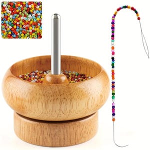May include: A wooden bead spinner with a stainless steel needle and a variety of colorful beads. The spinner has a wooden bowl and base. A separate image shows a small pile of beads.