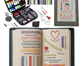 May include: A sewing kit with various colored threads, needles, scissors, and other tools. A gray notebook displays different embroidery stitches with text labels. A small, embroidered house design is also shown.