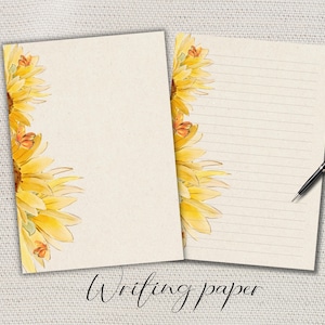 May include: Two sheets of writing paper with a sunflower design. One sheet is blank, and the other is lined. A black pen rests on the lined sheet. The words "Writing paper" are written in cursive at the bottom.