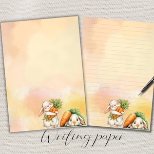 Könnte beinhalten: Zwei Blätter Schreibpapier mit aquarelliertem Hintergrund in Pfirsich- und Gelbtönen. Der untere Teil jedes Blattes zeigt ein Cartoon-Kaninchen, das eine Karotte hält. Der Text "Writing paper" ist unten in Kursivschrift geschrieben.