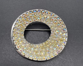 Broche redondo vintage con diamantes de imitación