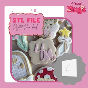 May include: A collection of decorated cookies featuring a fairy, a star wand, a mushroom, a door, and a square cookie with the number 4 and a fairy silhouette. Includes a white square stencil with a cutout of the number 4 and a fairy silhouette.