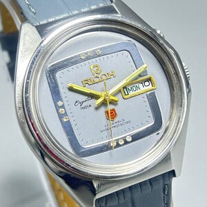 Zeldzame vintage RICOH CRYSTAL INDIA automatisch 21 juwelen dag-datum beweging Japan Made grijze wijzerplaat herenpolshorloge
