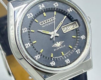 Reloj de pulsera Citizen Railway Time Eagle 7 vintage, automático, 21 joyas, día, fecha, n.° 8200A, esfera negra, para hombre.