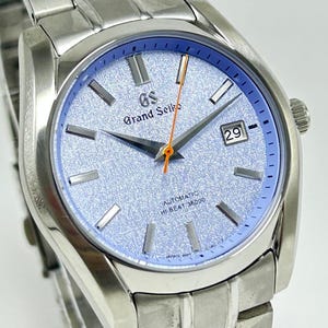 Refurbished Grand Seiko Automatic Movement With Date Indicator Blue Dial Rotating Bazzel Men's Wrist Watch With Stainless Steel Band.