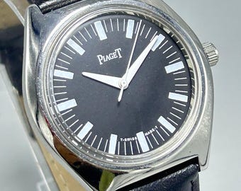 Reloj de pulsera PIAGET vintage raro para hombre con 17 joyas, esfera negra y movimiento manual suizo.