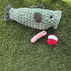 Peluche a forma di pesce persico fatto a mano all&#39;uncinetto