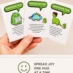 May include: Three white cards with cartoon dinosaur illustrations and the text "DINOSAUR HUG." Each card features a different dinosaur design and a message about hugs. The bottom of the image has the text "SPREAD JOY ONE HUG AT A TIME."