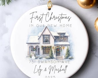 May include: White ceramic Christmas ornament with a watercolor illustration of a house in winter. The ornament reads "First Christmas in Our New Home," with the address, names, and year 2025.