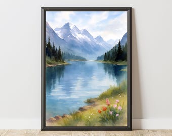 May include: A framed watercolor print of a mountain lake scene. The artwork features a serene lake reflecting snow-capped mountains, with evergreen trees lining the shores. Wildflowers bloom in the foreground. The text "CutCraftedCo" is at the bottom.