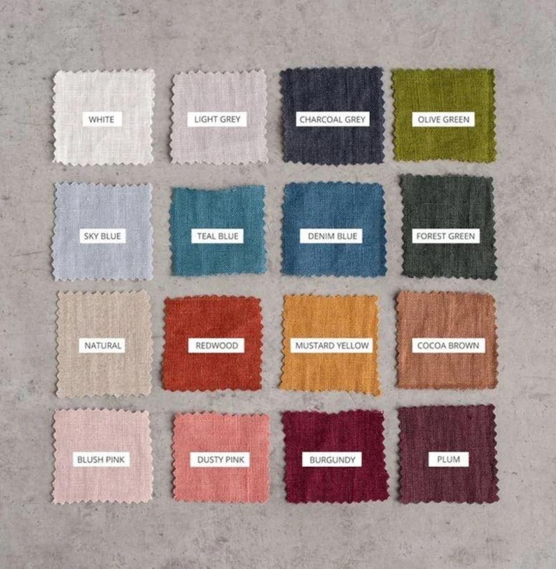 May include: A collection of sixteen fabric swatches in various colors, including white, light grey, charcoal grey, olive green, sky blue, teal blue, denim blue, forest green, natural, redwood, mustard yellow, cocoa brown, blush pink, dusty pink, burgundy, and plum. Each swatch has a label.