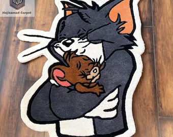Alfombra hecha a mano con mechones de Tom abrazando a Jerry.