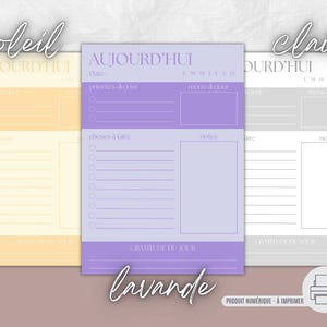 May include: Three printable daily planner sheets in pastel colors: yellow, lavender, and gray. Each sheet features the text "AUJOURD'HUI" and sections for priorities, to-do lists, and notes. The word "lavande" is written in cursive.